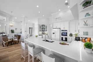 Beachy waterfront home with heated pool and S exposure - 1