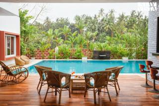 StayVista at Azure Bliss with Huge Pool, BBQ, Wi-Fi - Nagaon - 9