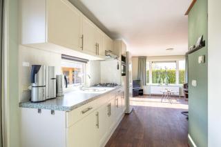 Chalet Paradys met Sauna op Park De Friese Wadden Tzummarum, buitenzwembad aanwezig - Tzummarum - 9