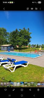 Chalet Paradys met Sauna op Park De Friese Wadden Tzummarum, buitenzwembad aanwezig - Tzummarum - 5