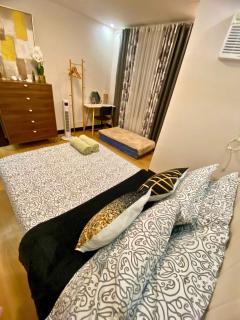 Neat and Fresh Fast Wifi with Pay parking PH Arena condo - Marilao - 8