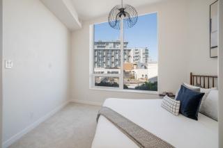 Olympic Village 3BR Condo with Balcony and City Views for 7 - 3