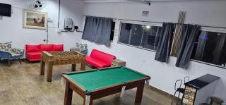 Belíssima Casa a Beira Mar com Piscina Aquecida Cobrado a Parte, 5 Quartos com Ar Condicionado, Amplo Salão de Jogos com Mesas de Bilhar e Pebolim, Amplo Espaço Externo com Churrasqueira em Deck Gourmet Coberto frente a Piscina,Tudo isso á Beira Mar - 3