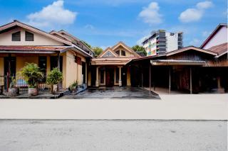 Hotel O Balikpapan near Taman Beruang Madu formerly Palm Cafe Inn - 0