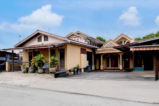 Hotel O Balikpapan near Taman Beruang Madu formerly Palm Cafe Inn - Balikpapan - 9