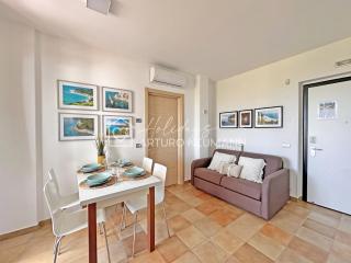 229 - Appartamento trilocale al primo piano con ampio terrazzo - al residence Adamo ed Eva con piscina e campo da calcetto, climatizzato - SPIAGGIA INCLUSA AL WHITE BEACH CLUB - 7