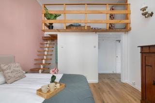 Charming Apartment with Mezzanine near Old Town in Cracow by Noclegi Renters - 7