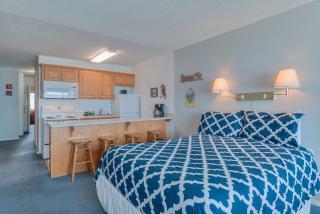 Beachy Second Floor Beachfront Suite With Full Kitchen - Sleeps 4 - Pool and Sauna - 2