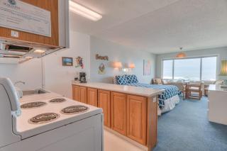 Beachy Second Floor Beachfront Suite With Full Kitchen - Sleeps 4 - Pool and Sauna - 1