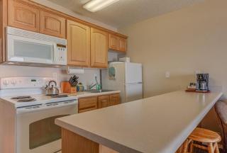 Steps to the Sand Ground Floor Beachfront Condo - Sleeps 4 Pool and Sauna - 7