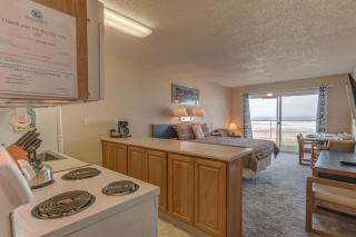 Steps to the Sand Ground Floor Beachfront Condo - Sleeps 4 Pool and Sauna - 9