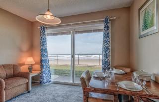 Steps to the Sand Ground Floor Beachfront Condo - Sleeps 4 Pool and Sauna - 1