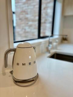 Close to Arena and one kilometer from Railway station onsite EV car park - 7