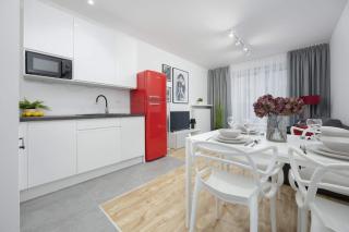 Modern Apartment in Warsaw with Garden and Parking by Noclegi Renters - 1