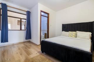 classy executive two bedroom apartment with swimming pool, ample parking space children playing ground and amazing scenic views - Nairobi - 8