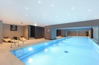 Spacious 1BR Flat with Pool, Cinema & Gym, High Street Kensington - London - 1