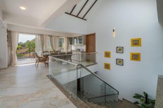 SaffronStays Flora - 4BR Sahyadri mountain villa with infinity pool, fireplace, gourmet meals & gardens - 4