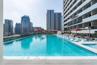 Vogue MAG318 Downtown Dubai with Skyline and Pool View, Steps to Burj Khalifa and Dubai Mall, Amazing Pool & Gym Access - Sabkhah - 8