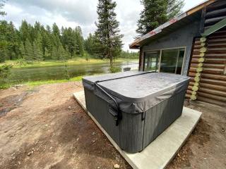 Charming Riverfront Cabin with Hot Tub and Dock Access Near Scenic Trails in Island Park, Idaho - Island Park - 1