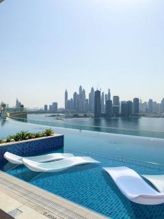 GuestReady – Infinity Pool and Beach l Palm - 4