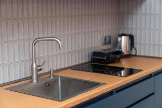 1BR Apt with Modern Comfort & Balcony - by Wehost - 1