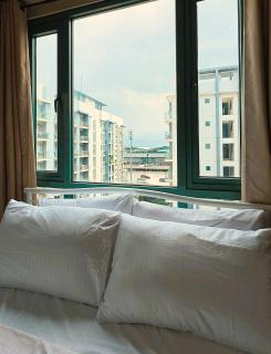 Restful Layover Condo Across NAIA3 - 1