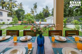 StayVista at 27 Flora with Lawn, Pool, WiFi - Nagaon - 7