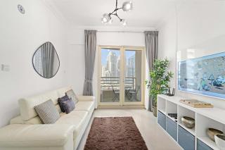 Modern 1BR with Marina Views, Pool, Gym, Near Beach - 0