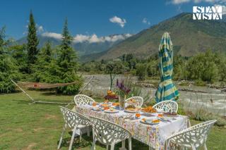 StayVista at The Nestled North with Bonfire, lawn - 8