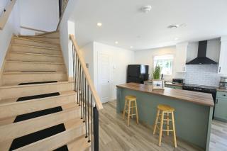 Condo Bord de fleuve Piscine - Les Voitures d'Eau - 1