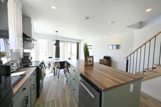 Condo Bord de fleuve Piscine - Les Voitures d'Eau - 1