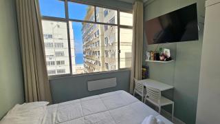 Refúgio Silencioso Copacabana com Vislumbre do Mar - 8