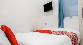 Super OYO 91074 Stariez Senen Syariah - 7
