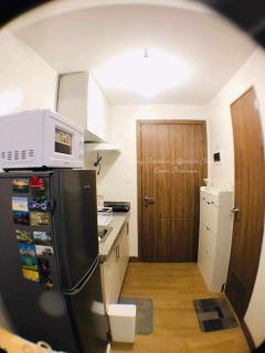 Sky Suites at Spring Residences Condotel near NAIA and SM Bicutan Mall - 1