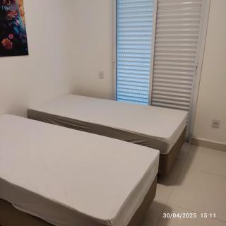 Apartmento em Ubatuba 350 m da praia das Toninhas 2 dormitórios, piscina, varanda gourmet com churrasqueira, ar condicionado, cozinha completa, garagem privativa - Ubatuba - 5