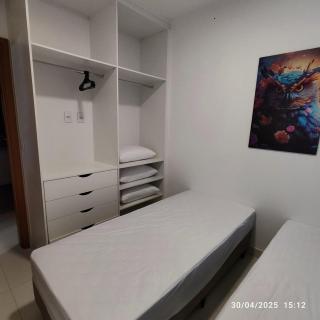 Apartmento novo a 350 m da praia das Toninhas em Ubatuba - 2 dormitórios sendo 1 suite, piscina, varanda gourmet com churrasqueira, ar condicionado, cozinha completa, garagem privativa - 7