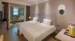 Magnotel Hotel Shiyan Wuyan Pedestrian Street - Shiyan - 9