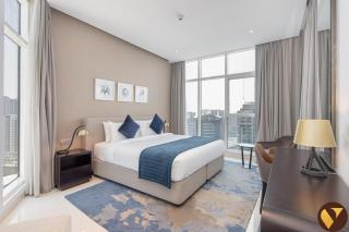 Vogue Vacation Homes, Business Bay Damac Maison Prive near Burj Khalifa and Dubai Mall, One Bedroom Apartment with Balcony, Canal and City Skyline View, Access to all Amenities - 7