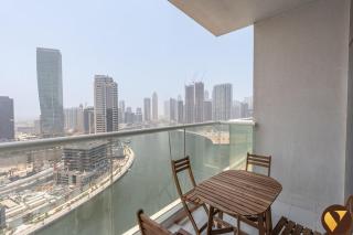 Vogue Vacation Homes, Business Bay Damac Maison Prive near Burj Khalifa and Dubai Mall, One Bedroom Apartment with Balcony, Canal and City Skyline View, Access to all Amenities - 8