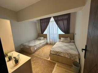 A hotel apartment for rent in front of the Egypt Mall - ‘Ezbet `Abd el-Ḥamîd - 8