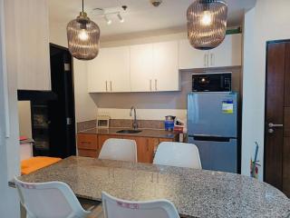 Modern Spacious 2BR 68 sqm Condo in Manhattan Heights Pool View - 1