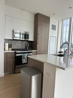 Modern Corner High-Rise with Hudson River Views - 1
