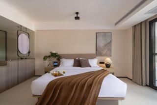 Yunbo Curie Hotel - Xishuangbanna Jinghong Gaozhuang Xishuangjing Starry Night Market Branch - 1