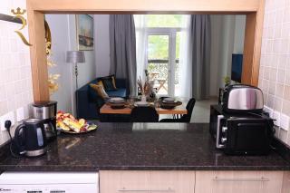 Supernova Haven 1BR - Peaceful Poolside Getaway Near Yas Mall & Marina - 1