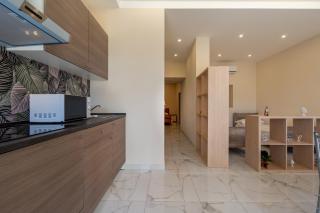 GuestHost - Isole Ciclopi View - Lovely Apartment - 1