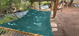 Room with 1 King bed and 1 Queen bed at the Cedaredge Lodge - 7
