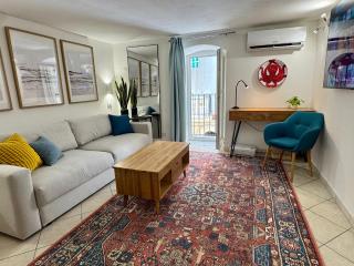 Stylish Apartment Steps from the Beach - 0