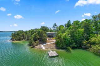Rustic Lakefront Home with Beach - 0