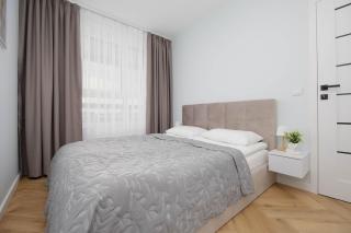 Beige Apartment in Warsaw with Parking and Air Conditioned Living Room by Noclegi Renters - Varsavia - 9