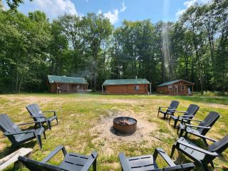 Secluded Rustic Cabins with Private Pond & Trails near ORV Routes in White Cloud, Michigan - 1